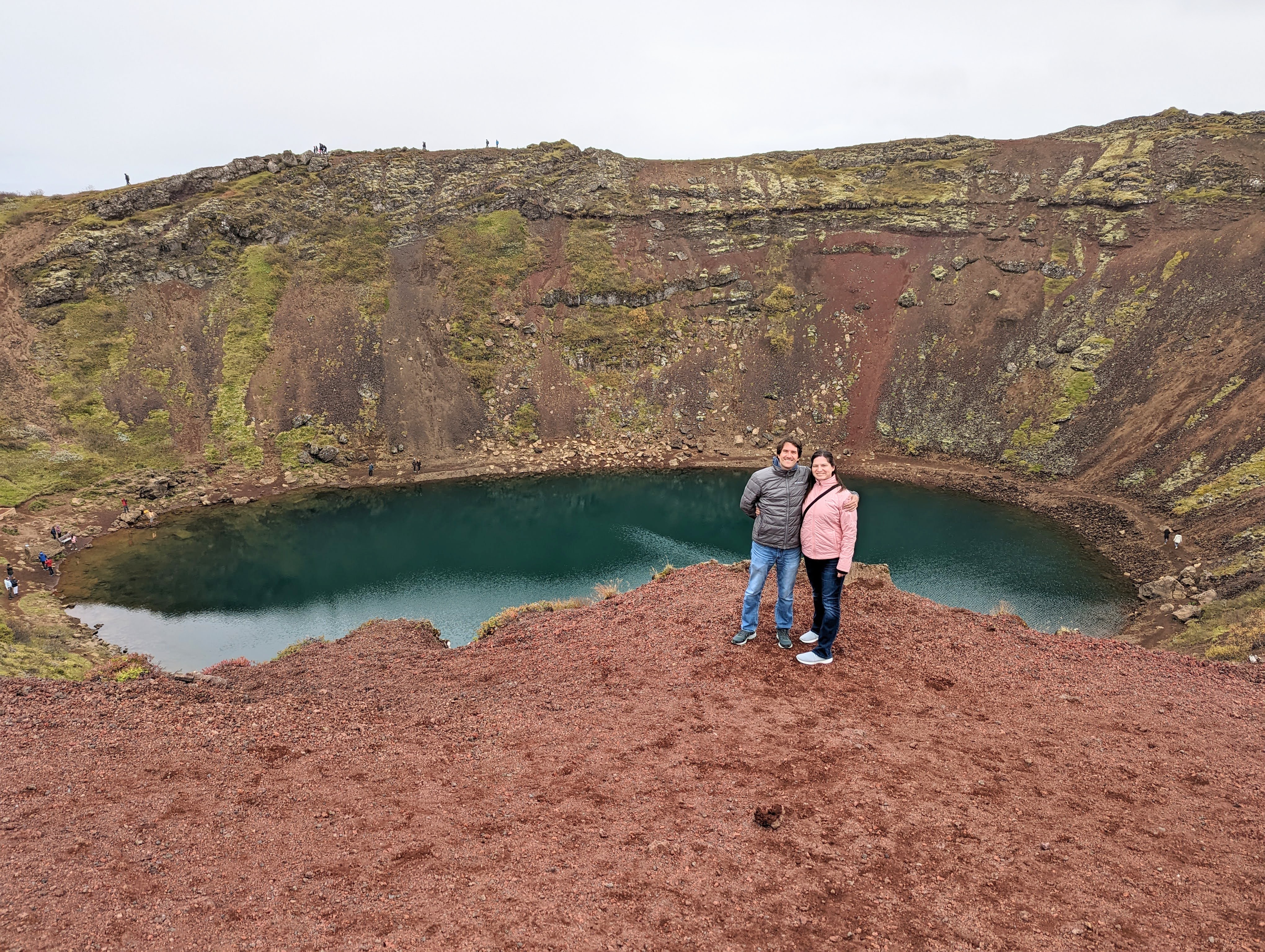 Picture of two fancy people in front of Kerið Crater